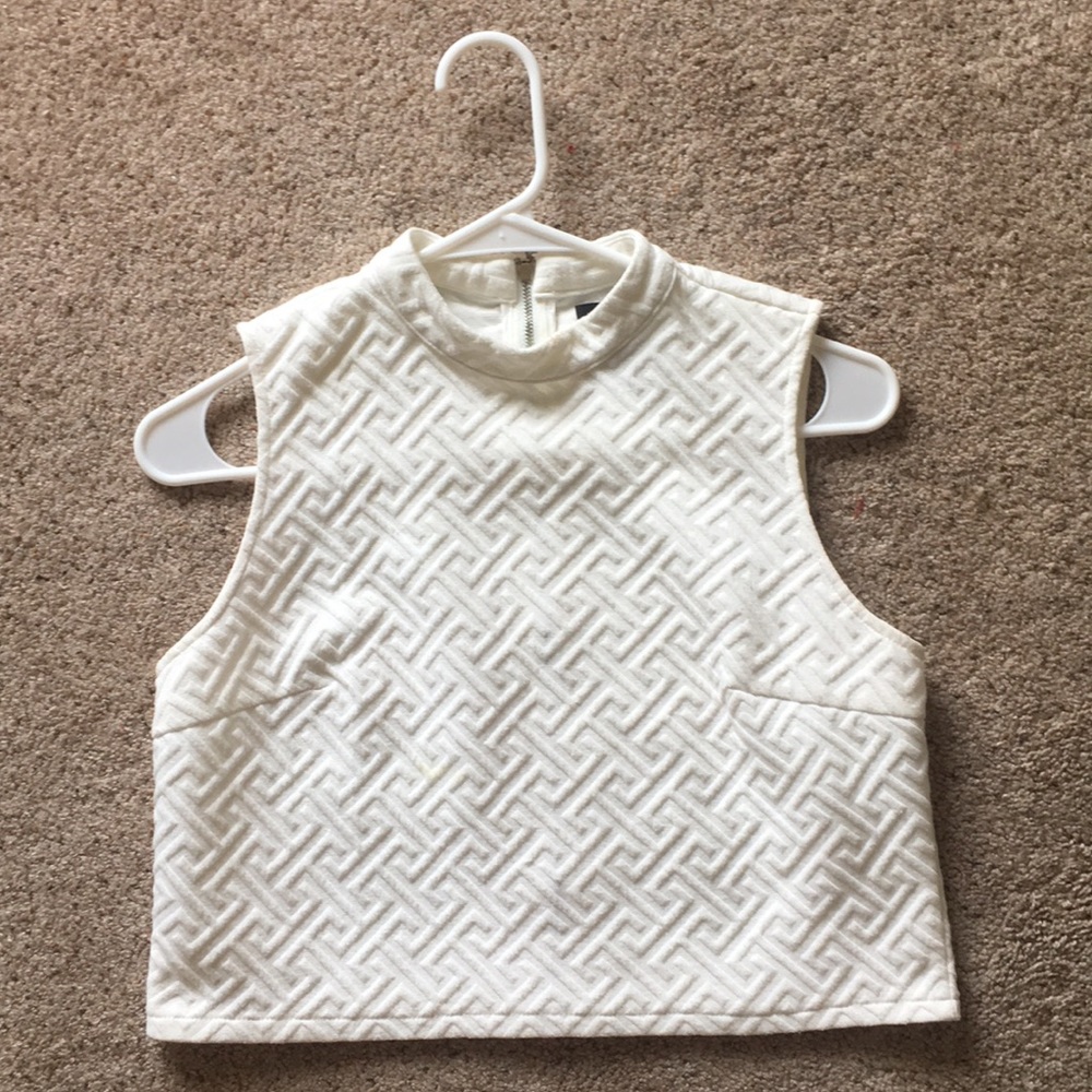 White sleeveless top
